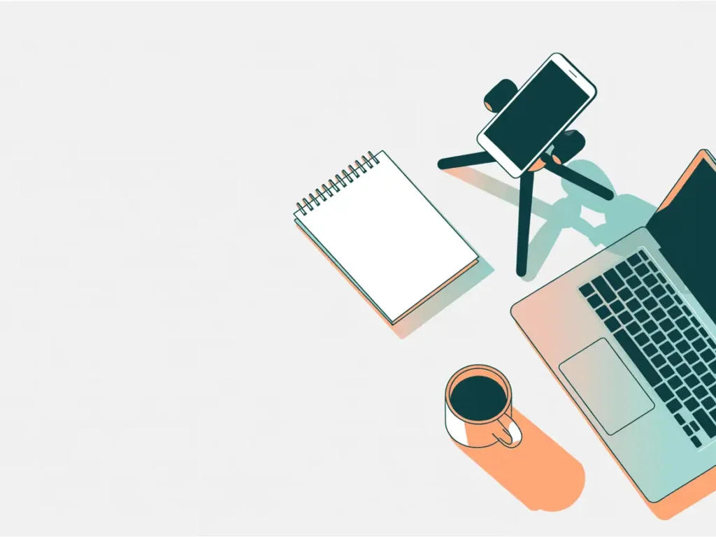Minimalist flat lay of laptop, smartphone tripod, notebook, and coffee cup, used for recording educational content. 