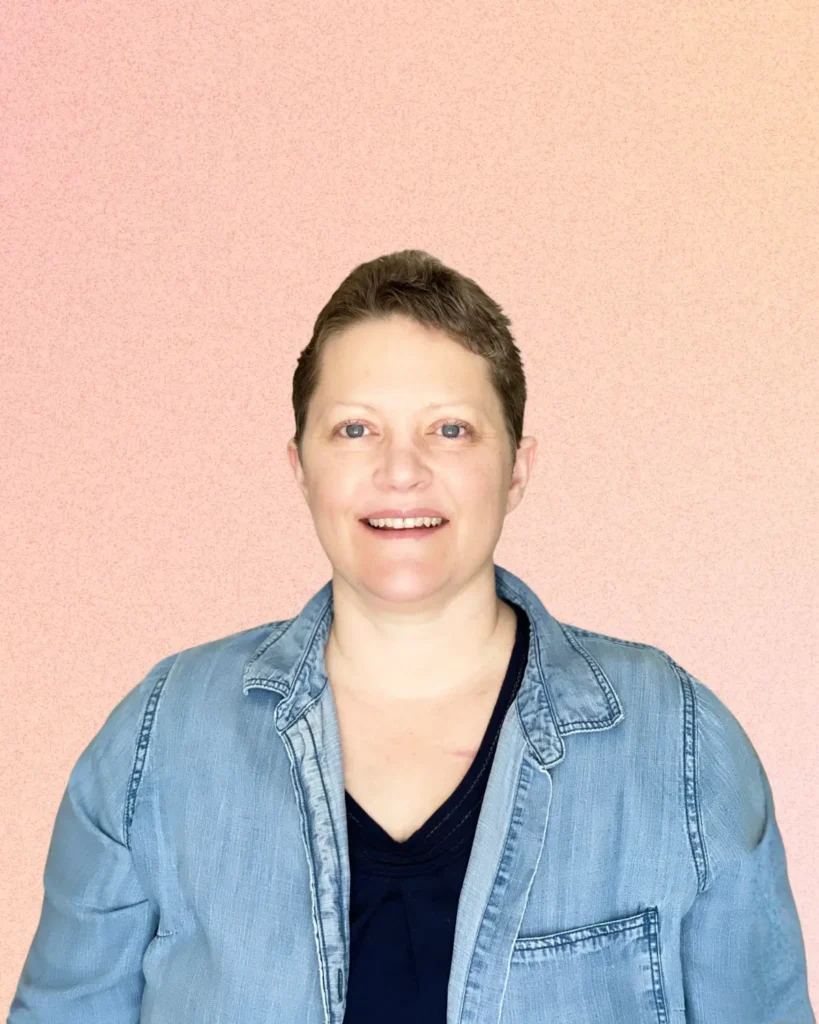 Eileen Guevara of Teach with ND, blue shirt on peach background